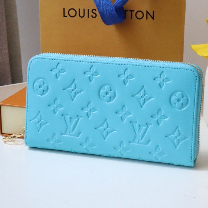 13349352862035498 ZIPPY WALLET 19 CLOUD BLUE EMBOSSED LAMBSKIN