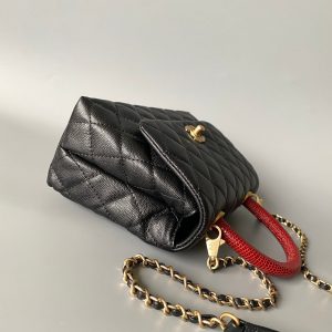 coco handle flap bag 23cm black quilted caviar with red top handle