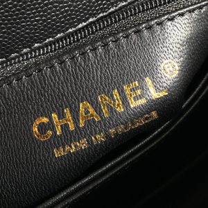 coco handle flap bag 23cm black quilted caviar with red top handle