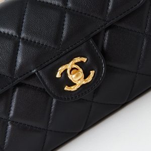 24a flap bag with top handle 18cm black lambskin gold hardware