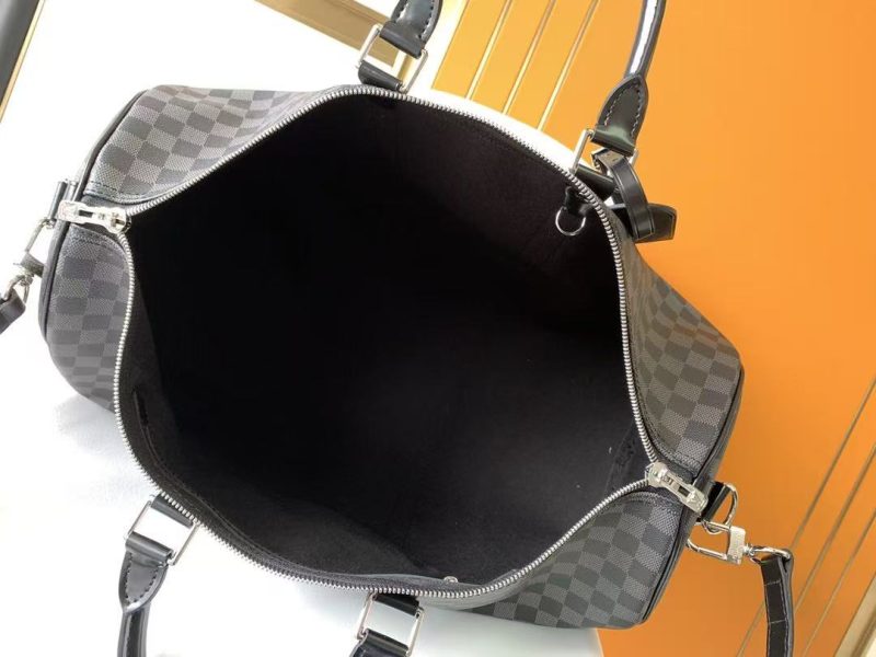 6a247d7199a25aa11450f434f167af2d KEEPALL BANDOULIÈRE 45 IN BLACK DAMIER GRAPHITE CANVAS