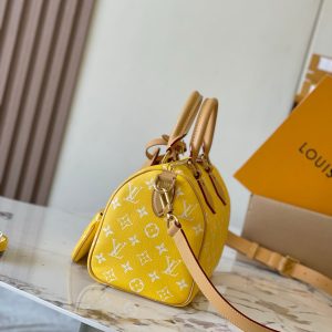 speedy p9 bandouliere 25cm yellow calfskin