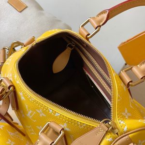 speedy p9 bandouliere 25cm yellow calfskin