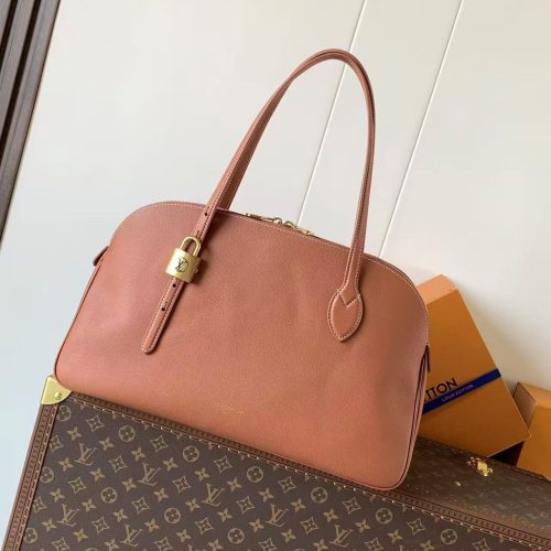 e24f457e6a834cd62ec0f4ac880e2c63 LV Low Key Duffle Tote Brown Calfskin