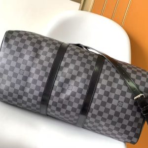 fc5b5aadea40b5cdc7dd1aeb060bf20a KEEPALL BANDOULIÈRE 45 IN BLACK DAMIER GRAPHITE CANVAS