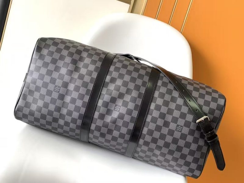 fc5b5aadea40b5cdc7dd1aeb060bf20a KEEPALL BANDOULIÈRE 45 IN BLACK DAMIER GRAPHITE CANVAS