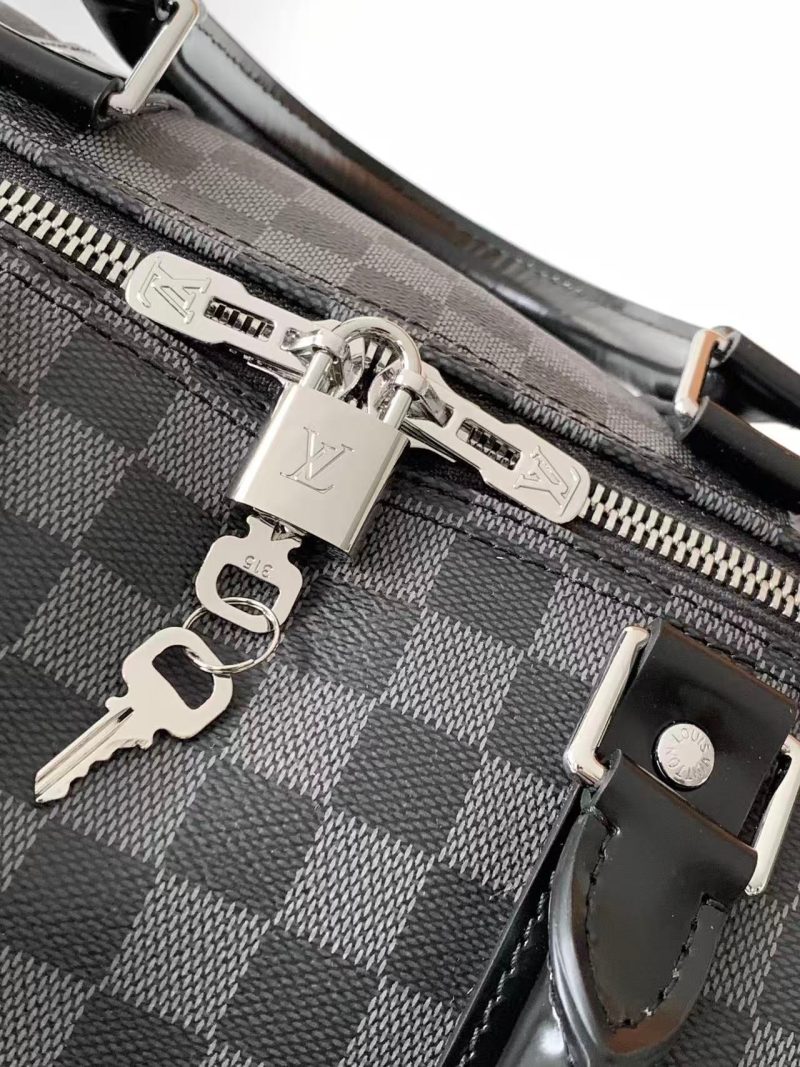 fdb9471c19bab6b3187d05ced8d36fbd KEEPALL BANDOULIÈRE 45 IN BLACK DAMIER GRAPHITE CANVAS