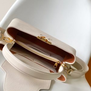 CAPUCINES GM 33CM BEIGE GOLD TAURILLON LEATHER 252023