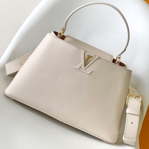 imgHD_2d10544c_20250506_cmp_i1746468777227_7181_0_0_jpg CAPUCINES GM 33CM BEIGE GOLD TAURILLON LEATHER 252023