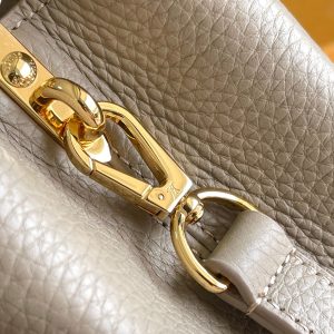 CAPUCINES BB 27 DARK BEIGE TAURILLON GOLD HARDWARE