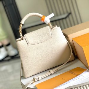CAPUCINES MINI 21 BEIGE TAURILLON GOLD HARDWARE