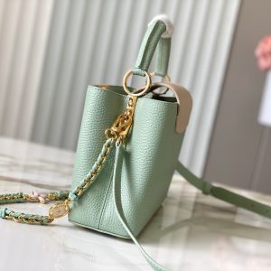 capucines bb 27 green beige taurillon leather gold hardware