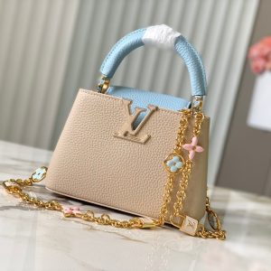 capucines mini 21 beige cloud blue taurillon leather gold hardware