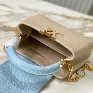 capucines mini 21 beige cloud blue taurillon leather gold hardware