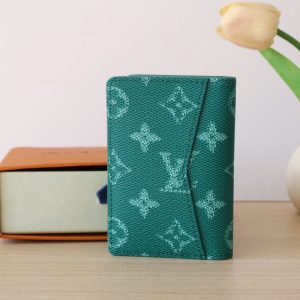 LV Pocket Organizer Monogram Heritage Canvas