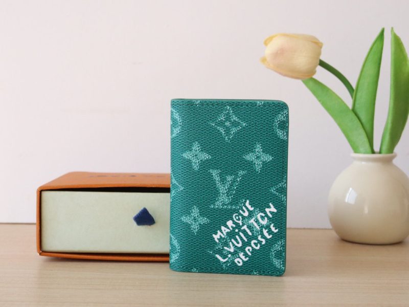 LV Pocket Organizer Monogram Heritage Canvas