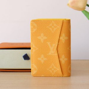 LV Pocket Organizer Monogram Heritage Canvas