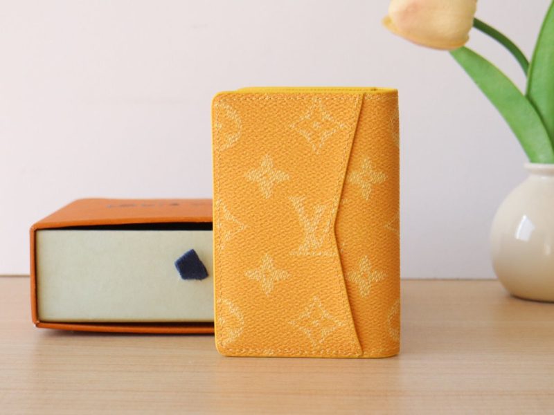 LV Pocket Organizer Monogram Heritage Canvas