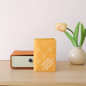 LV Pocket Organizer Monogram Heritage Canvas