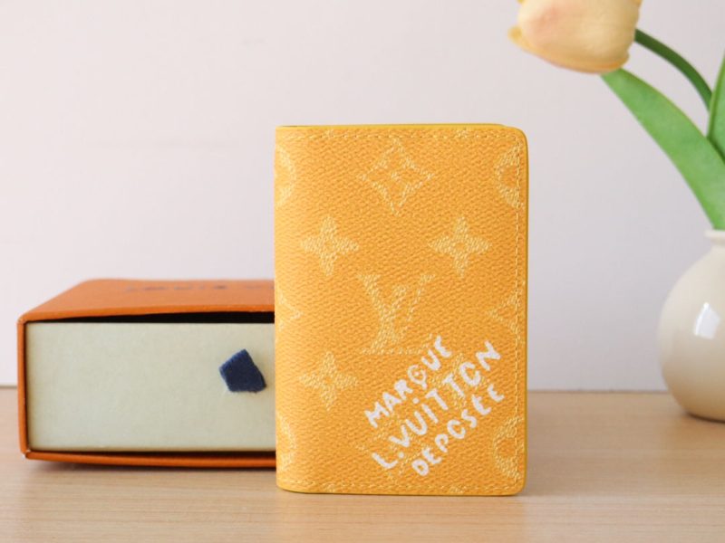 LV Pocket Organizer Monogram Heritage Canvas