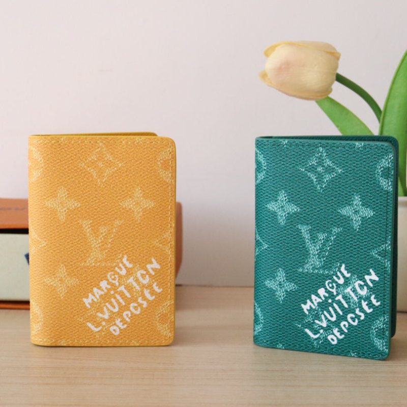 LV Pocket Organizer Monogram Heritage Canvas