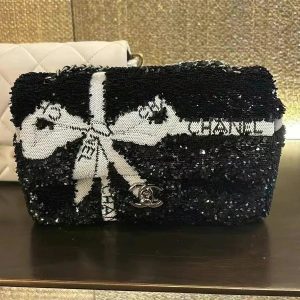 CC 25S FLAP BAG 20 CM IN BLACK SEQUINS WITH WHITE BOW