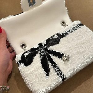 CC 25S FLAP BAG 20 CM IN WHITE SEQUINS WITH BLACK BOW