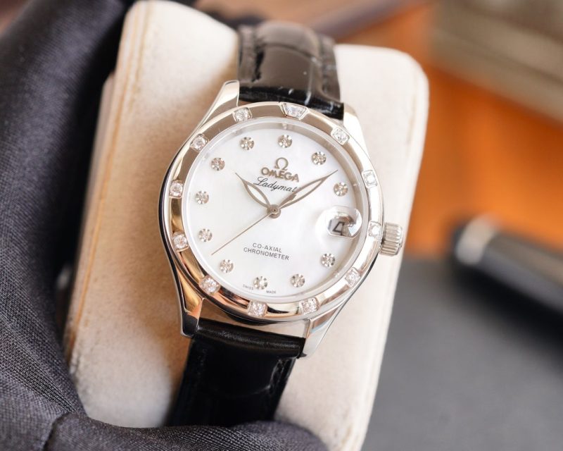 13276024907179467_40d68a87-d459-4308-9f2a-8c7986ba6b37 DE VILLE LADYMATIC 31MM DIAMOND BEZEL MOP DIAL