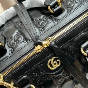 20220803_i1659505283_2984_6_jpg MATELASSÉ TOP HANDLE BAG 31 IN BLACK EMBOSSED CALFSKIN GOLD HARDWARE