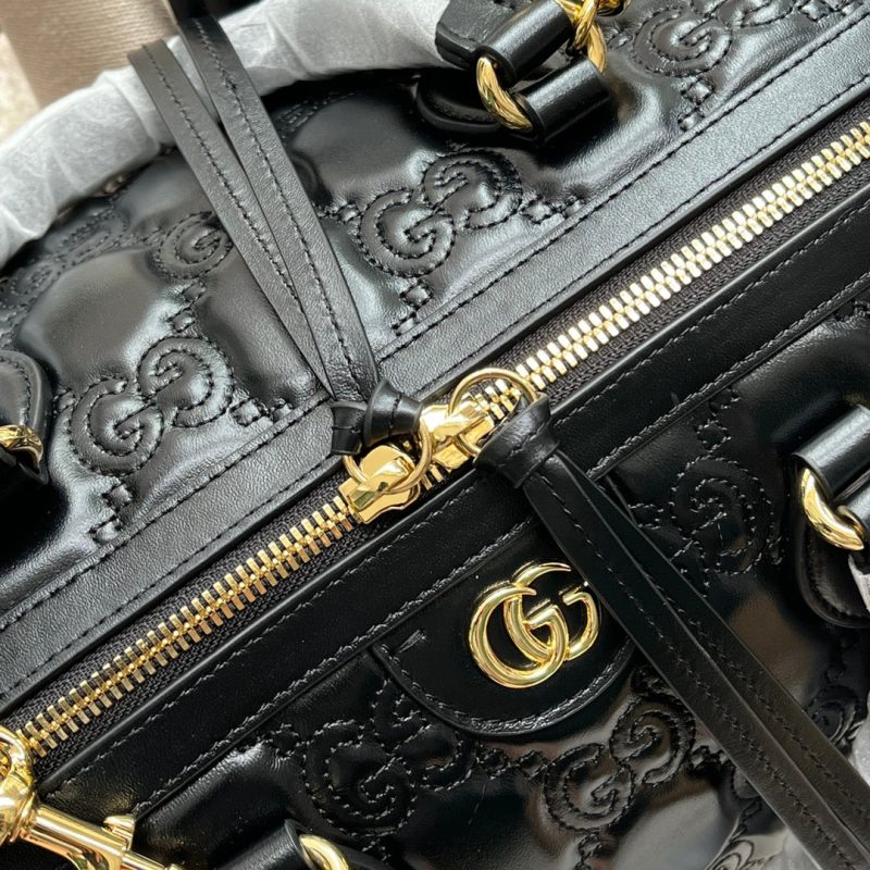 20220803_i1659505283_2984_6_jpg MATELASSÉ TOP HANDLE BAG 31 IN BLACK EMBOSSED CALFSKIN GOLD HARDWARE