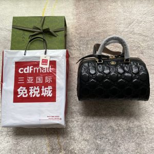 20220803_i1659505283_7088_0_jpg MATELASSÉ TOP HANDLE BAG 31 IN BLACK EMBOSSED CALFSKIN GOLD HARDWARE