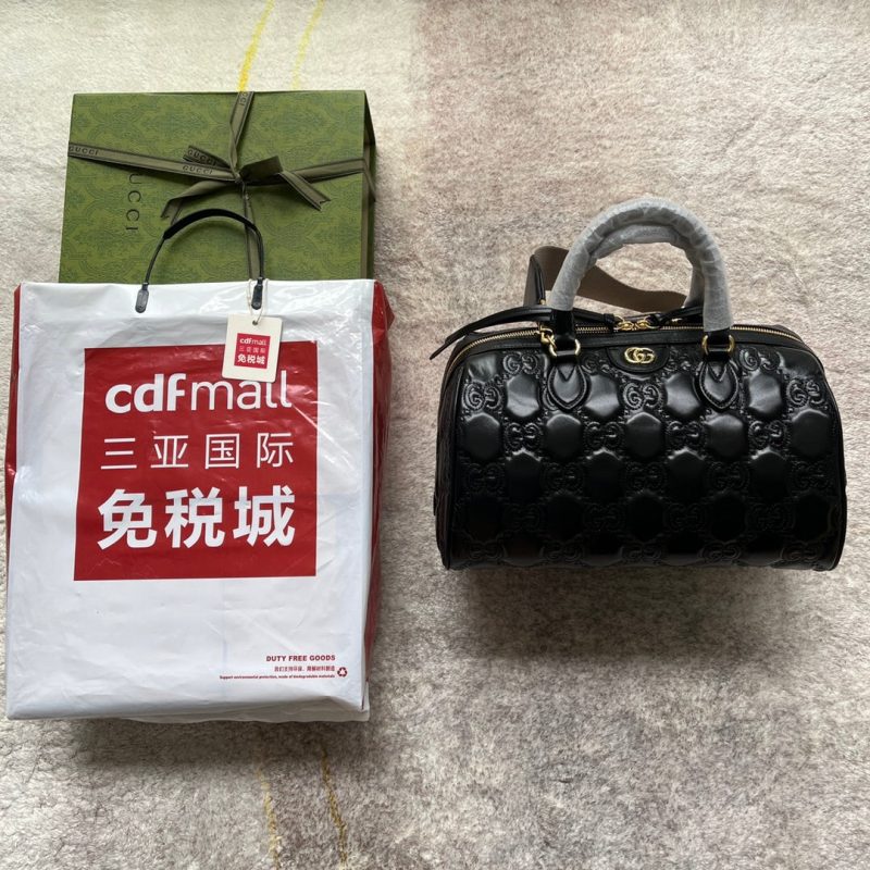 20220803_i1659505283_7088_0_jpg MATELASSÉ TOP HANDLE BAG 31 IN BLACK EMBOSSED CALFSKIN GOLD HARDWARE