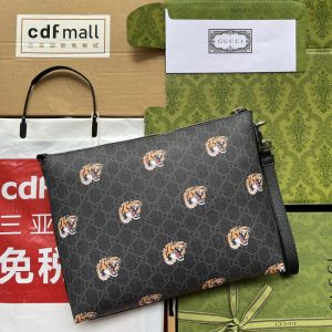 20220907_i1662527417_3336_1_jpg CLUTCH WITH TIGER PRINT 30 IN BLACK MONOGRAM CANVAS