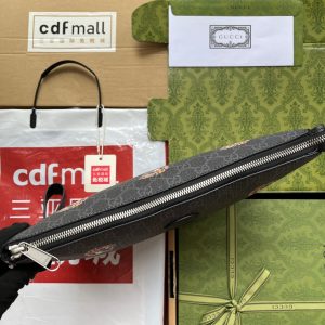 20220907_i1662527417_348_2_jpg CLUTCH WITH TIGER PRINT 30 IN BLACK MONOGRAM CANVAS