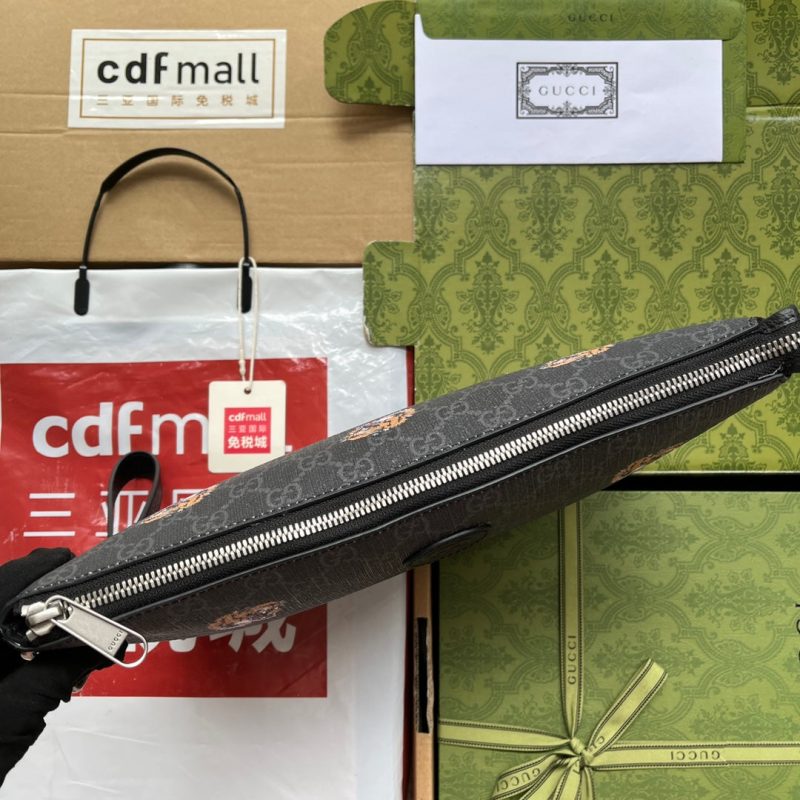 20220907_i1662527417_348_2_jpg CLUTCH WITH TIGER PRINT 30 IN BLACK MONOGRAM CANVAS