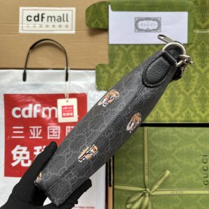 20220907_i1662527417_3614_3_jpg CLUTCH WITH TIGER PRINT 30 IN BLACK MONOGRAM CANVAS