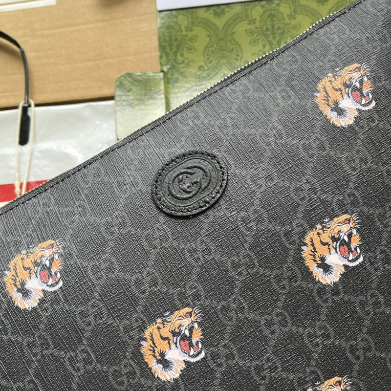20220907_i1662527417_3687_5_jpg CLUTCH WITH TIGER PRINT 30 IN BLACK MONOGRAM CANVAS