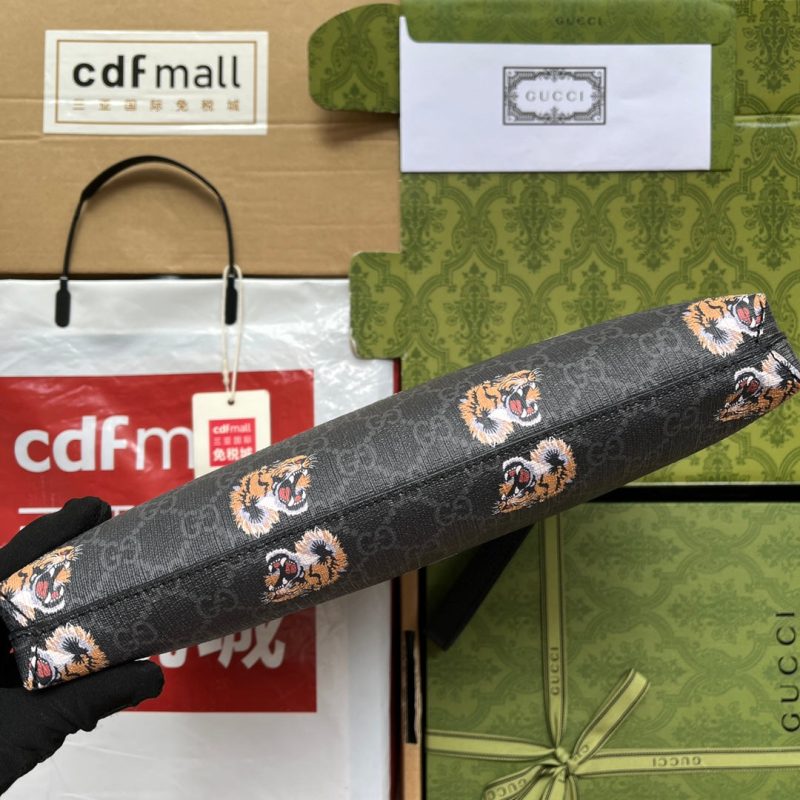 20220907_i1662527417_7166_4_jpg CLUTCH WITH TIGER PRINT 30 IN BLACK MONOGRAM CANVAS