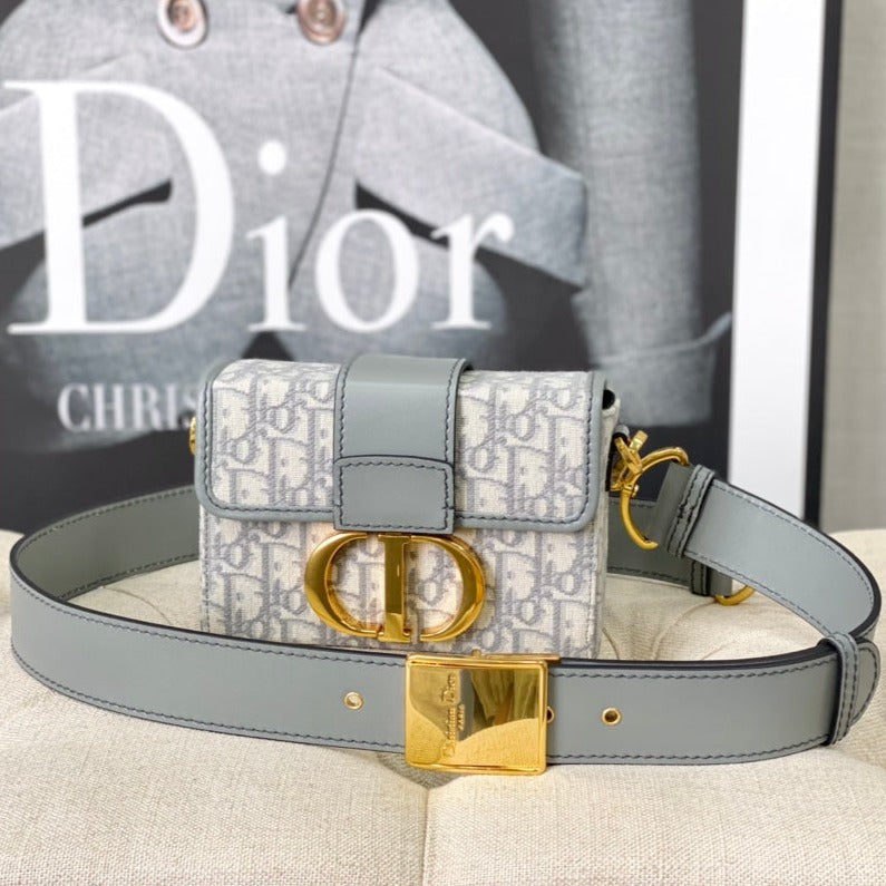 20230511_i1683772942_3509_0_jpg MONTAIGNE 19 HANDBAG IN GREY CALFSKIN