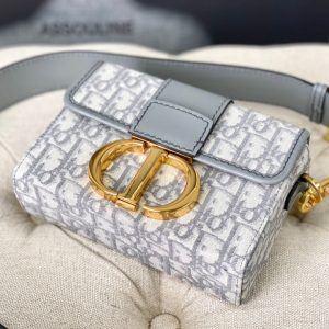 20230511_i1683772942_6077_6_jpg MONTAIGNE 19 HANDBAG IN GREY CALFSKIN