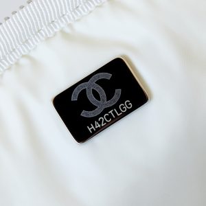 BACKPACK 22 IN WHITE FABRIC SILVER HARDWARE