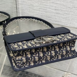 MONTAIGNE EAST-WEST 25 BAG WITH CHAIN IN NAVY BLUE LAMBSKIN AND MONOGRAM JACQUARD