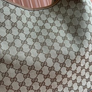 BODY MEDIUM SHOULDER BAD 49 IN BEIGE MONOGRAM CANVAS AND BROWN CALFSKIN GOLD HARDWARE