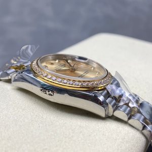 Datejust 31mm Yellow Gold Steel Diamond Bezel Champagne Dial Diamond Numerals