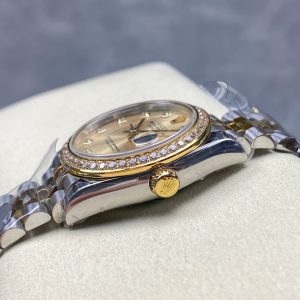 Datejust 31mm Yellow Gold Steel Diamond Bezel Champagne Dial Diamond Numerals