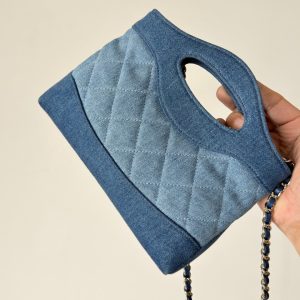 imgi_141_imgHD_b1ac09d1_20260126_cmp_o_1jfsp567r12fe128rosu1js311aa1_jpeg Chanel 26 Clutch 21 Blue Denim Gold Hardware