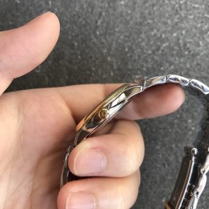 z2612399877134_201eca20b72b1d36c81c18a012be6c30_5dcd22c7-a460-4391-88bd-2778a2ec6915 DEVILLE PRESTIGE 27MM QUARTZ GOLD STEEL MOP DIAL